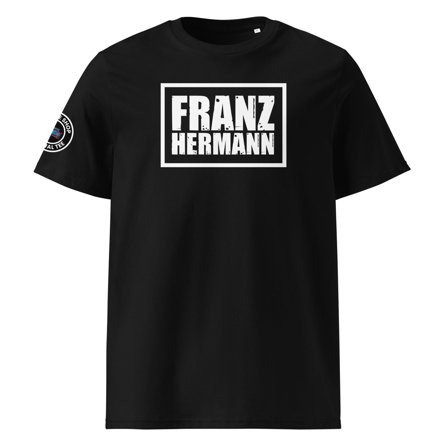 Front view of black unisex t-shirt with a bold, distressed white “Franz Hermann” box logo printed on the chest. DTF print, inspired by Verstappen’s Nürburgring GT3 radio moment. Rugged motorsport style for F1 fans.