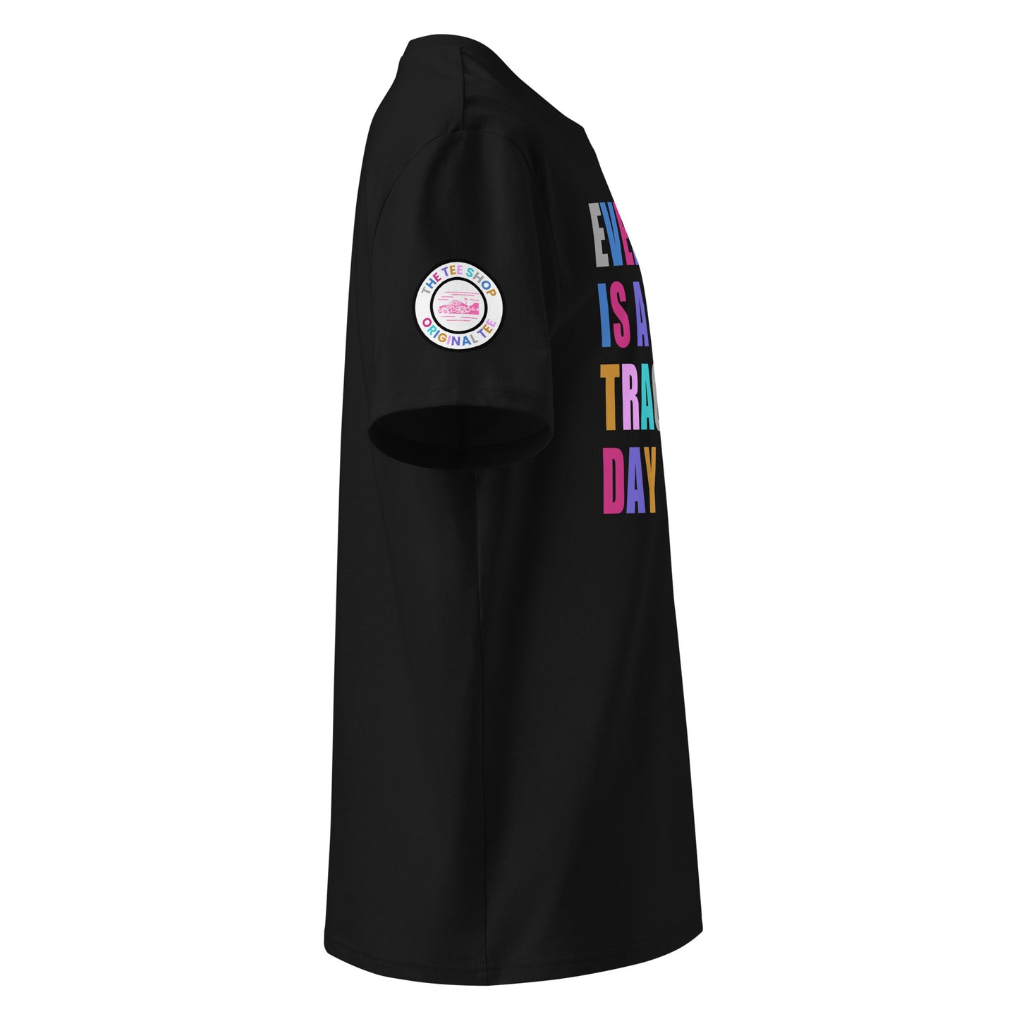 Right side view of black t-shirt showing The Tee Shop’s unique race car logo on the sleeve and edge of the multi-colour “EVERY DAY IS A TRACK DAY” front print. DTF print, motorsport-inspired style.