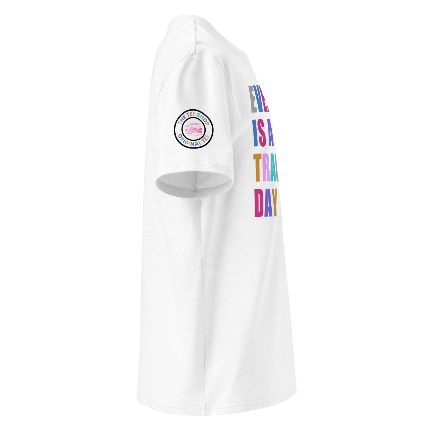 Right side view of white t-shirt showing The Tee Shop’s unique race car logo on the sleeve and edge of the multi-colour “EVERY DAY IS A TRACK DAY” front print. DTF print, motorsport-inspired style.