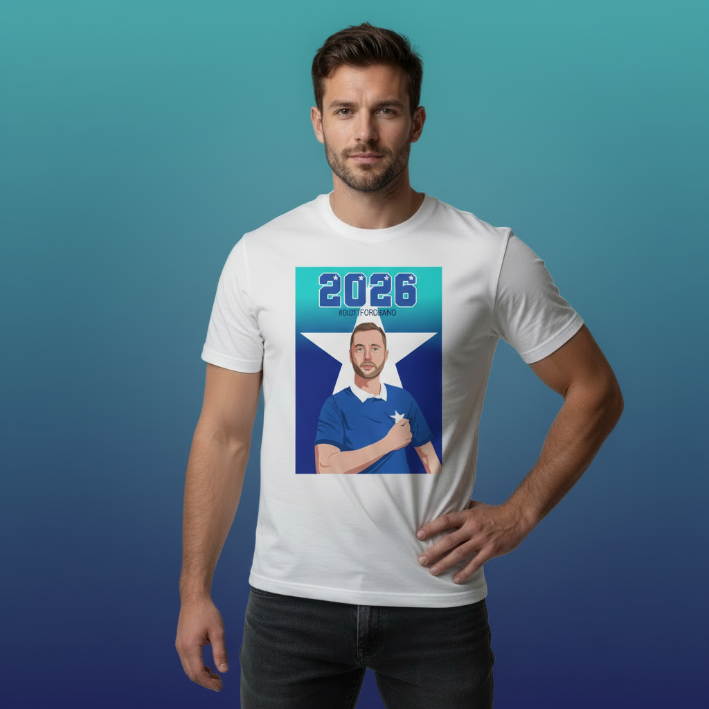 White rugby t-shirt with “2026” and “#DIDITFORDEANO” above an illustrated St Marys rugby captain in blue, set over a large white five-point star background.