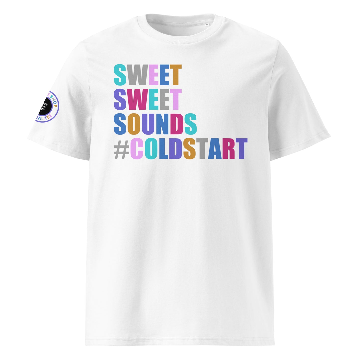 Front view of white unisex t-shirt with “SWEET SWEET SOUNDS #COLDSTART” slogan in multi-colour harlequin print. DTF print, perfect for cold start fans and car meet culture.