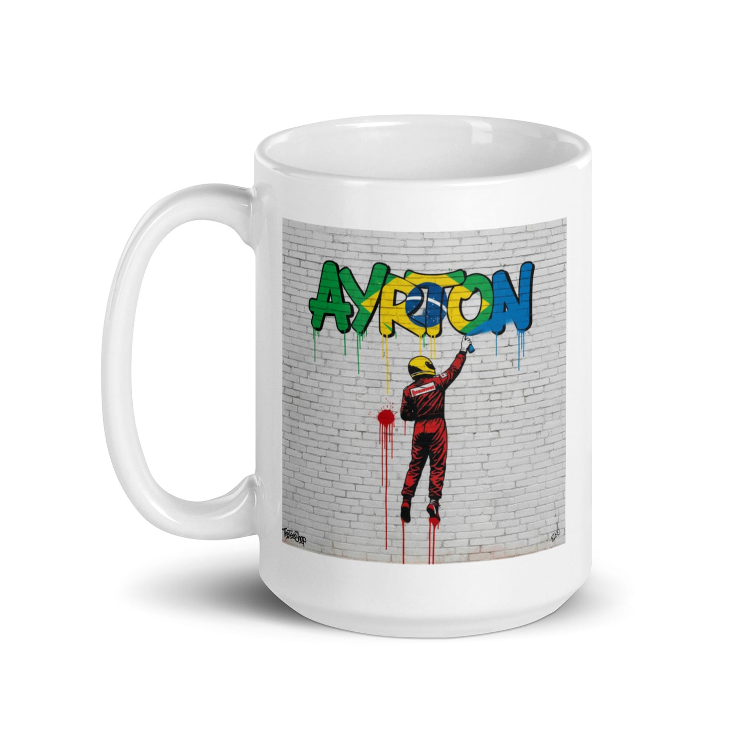 15oz white Ayrton Senna graffiti mug with handle on left.