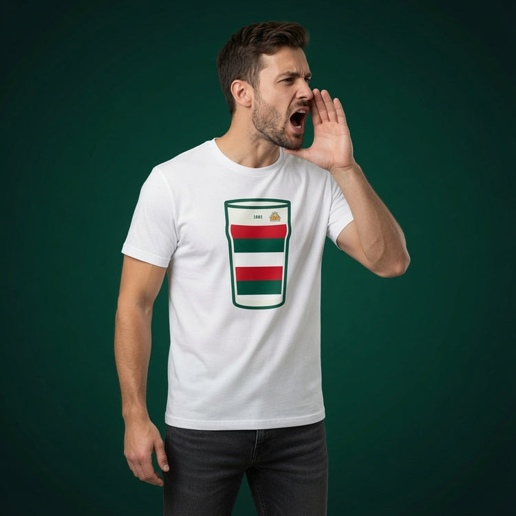 Man shouting wearing a white Bective Rangers Rugby t-shirt