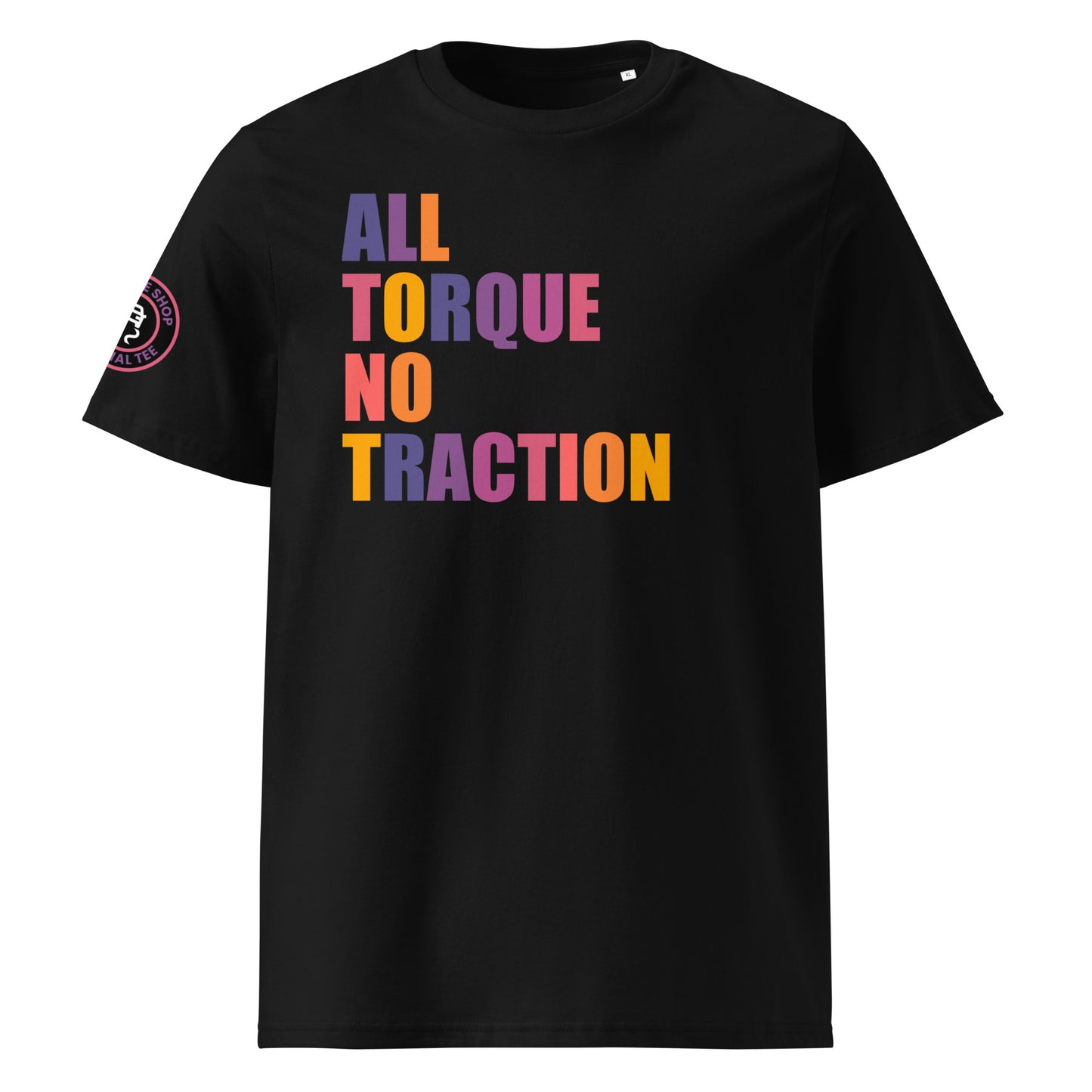 Front view of black unisex t-shirt with “ALL TORQUE NO TRACTION” slogan in multi-colour harlequin print. DTF print, perfect for car meets, torque fans, and petrolhead banter.