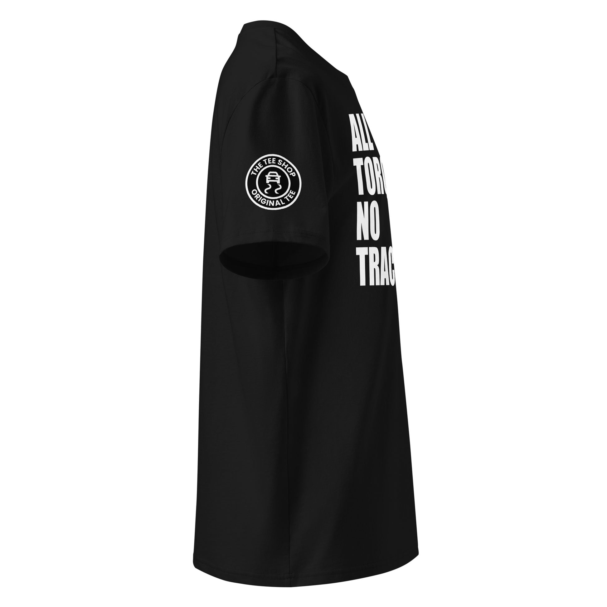Right side view of black t-shirt showing The Tee Shop’s traction control button logo on the sleeve and edge of the slogan. DTF print, car culture and banter tribute.
