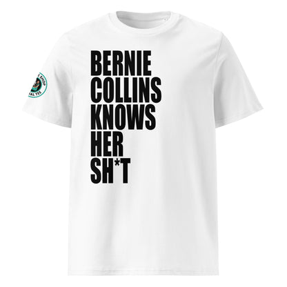 Front view of white unisex t-shirt with bold black slogan “BERNIE COLLINS KNOWS HER SH*T” in crisp font across the chest. DTF print, perfect for F1 and Sky Sports fans.