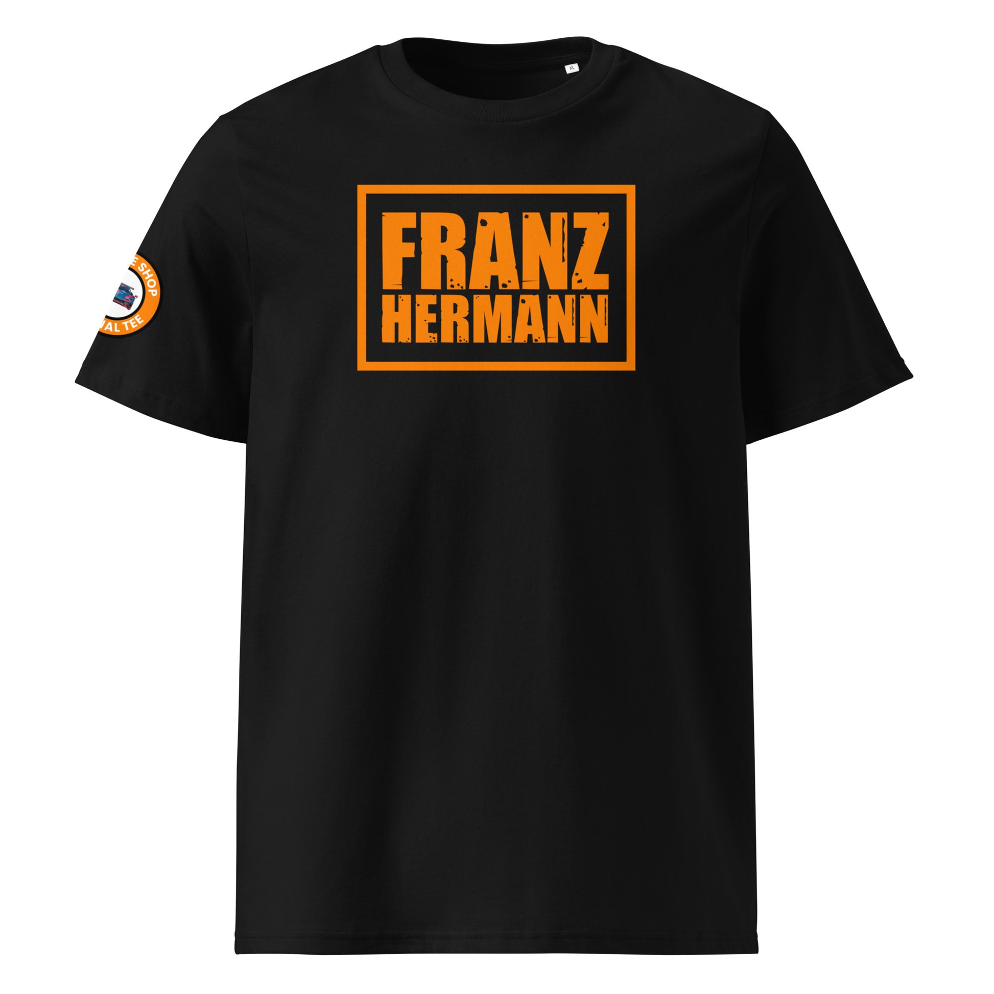 Front view of black unisex t-shirt with a bold, distressed orange “Franz Hermann” box logo printed on the chest. DTF print, Dutch-inspired, motorsport style for F1 fans.