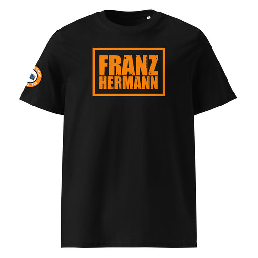 Front view of black unisex t-shirt with a bold, distressed orange “Franz Hermann” box logo printed on the chest. DTF print, Dutch-inspired, motorsport style for F1 fans.