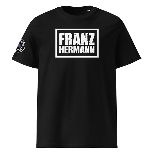 Front view of black unisex t-shirt with a bold, distressed white “Franz Hermann” box logo printed on the chest. DTF print, inspired by Verstappen’s Nürburgring GT3 radio moment. Rugged motorsport style for F1 fans.