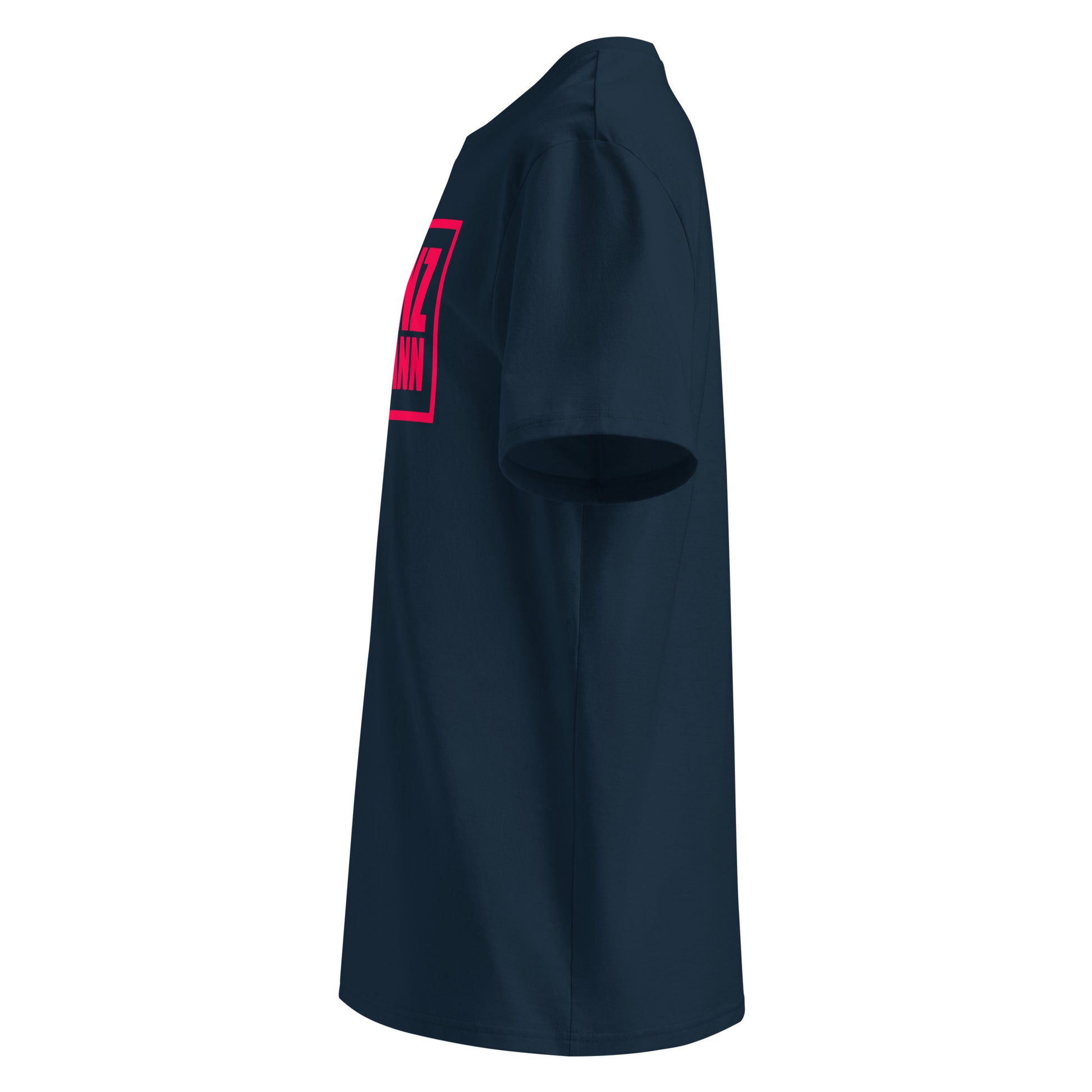 Left side view of navy unisex t-shirt, plain sleeve, visible side of Red Bull Racing pink Franz Hermann box logo. Minimalist, F1 fan style.