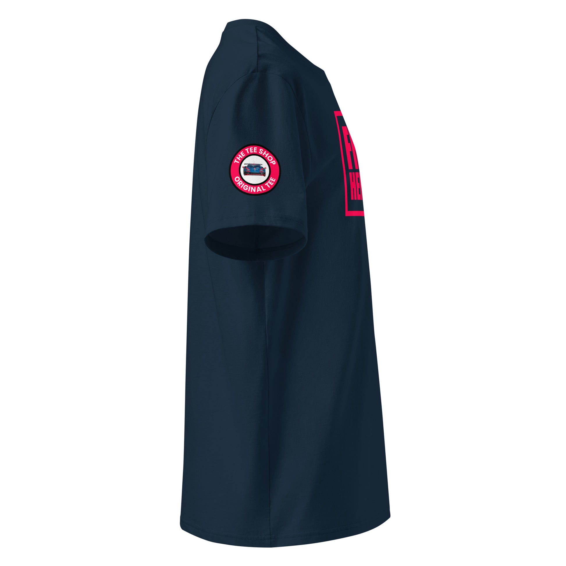 Right side view of navy t-shirt with The Tee Shop logo patch on the sleeve and edge of the Red Bull Racing pink Franz Hermann box logo. DTF print, F1-inspired style.