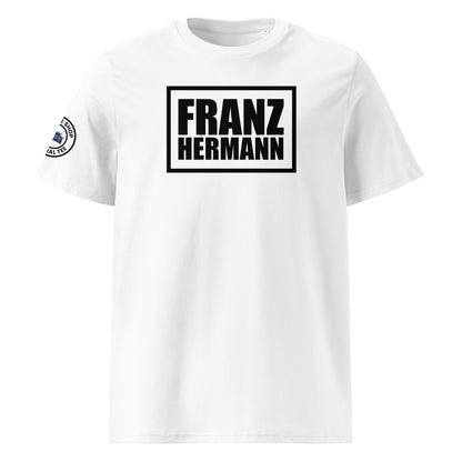 Front view of white unisex t-shirt with bold black “Franz Hermann” box logo printed on the chest. DTF print, inspired by Max Verstappen’s Nürburgring GT3 radio moment. Clean, professional motorsport style.