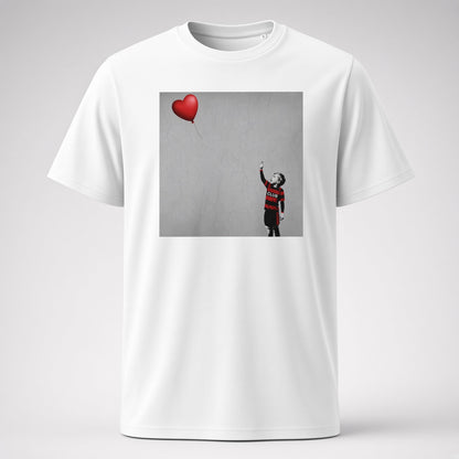White Blackheath Boy Dreams street art t-shirt featuring a stencil-style boy in Blackheath rugby club colours reaching for a red heart balloon on a grey wall background