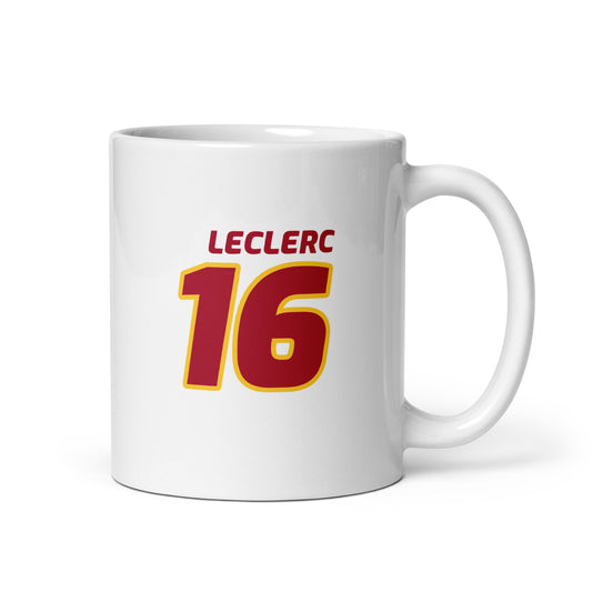 The Charles Leclerc Racing Mug showcasing Charles's name and number "16" in bold Ferrari team colours of red and yellow. Perfect for motorsport fans and collectors.