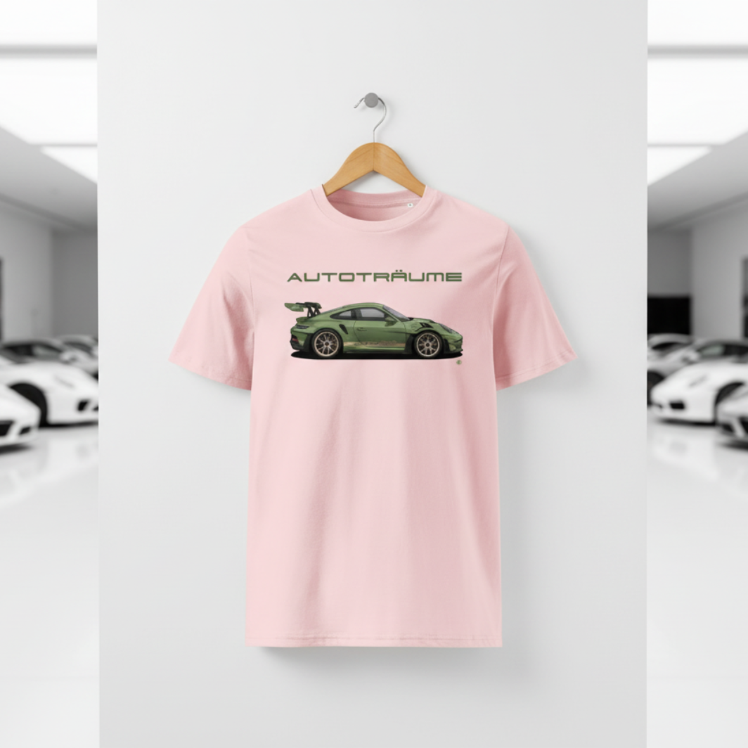 Cotton pink AUTOTRÄUME GT3 T‑shirt with an olive green Porsche‑style car illustration hanging on a premium wooden hanger and silver peg against a central white wall in a bright sports car gallery, with a glossy white floor and blurred white and silver sports cars running down both sides.