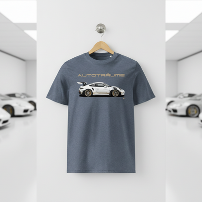 Dark heather blue unisex organic cotton AUTOTRÄUME GT3 RS T-shirt featuring a large, centred white Porsche-style GT3 RS car graphic with gold details hanging on a premium wooden hanger with a silver wall peg against a clean white wall panel in a bright modern sports car gallery with glossy floors and blurred white and silver sports cars on both sides.
