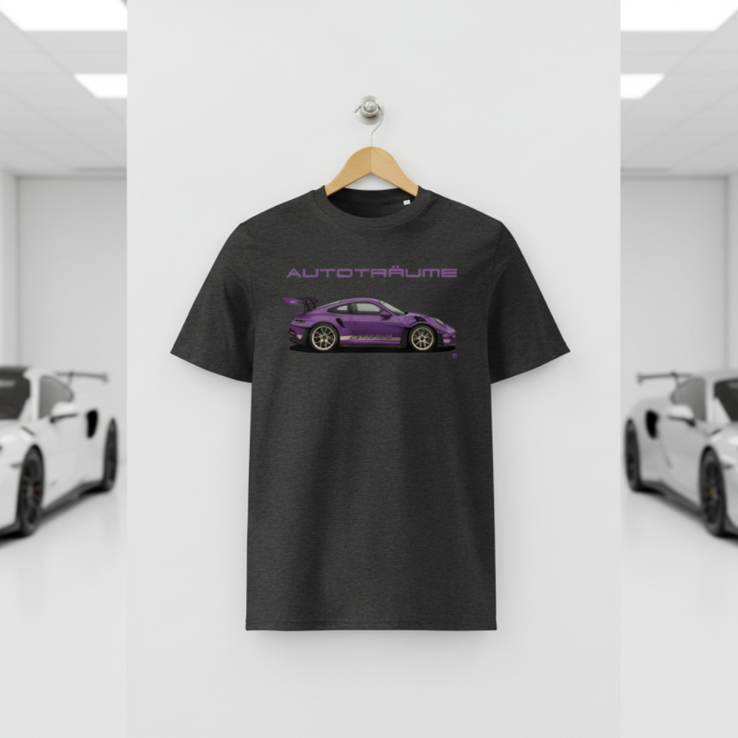 Dark heather grey AUTOTRÄUME GT3 T‑shirt with a purple Porsche‑style car illustration hanging on a premium wooden hanger and silver wall peg against a central white wall in a bright sports car gallery, with a glossy white floor and blurred white and silver sports cars running down both sides.