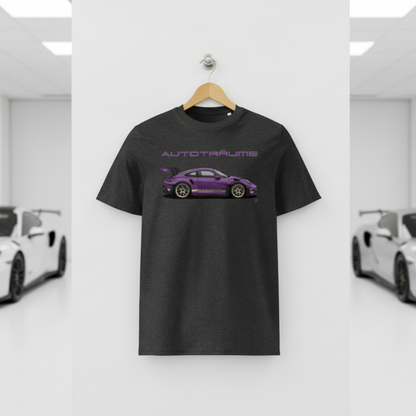 Dark heather grey AUTOTRÄUME GT3 T‑shirt with a purple Porsche‑style car illustration hanging on a premium wooden hanger and silver wall peg against a central white wall in a bright sports car gallery, with a glossy white floor and blurred white and silver sports cars running down both sides.