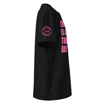 Right side view of black t-shirt showing The Tee Shop’s unique race car logo on the sleeve and edge of the pink “EVERY DAY IS A TRACK DAY” front print. DTF print, motorsport-inspired style.
