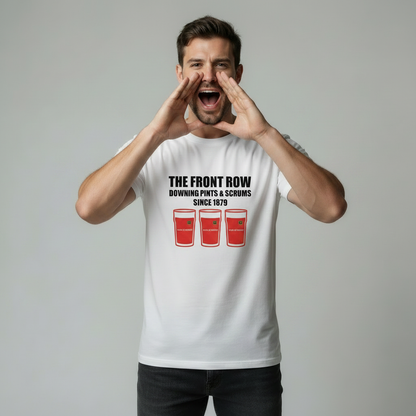Male model shouting with hands cupped around mouth wearing white Munster t-shirt with The Front Row Downing Pints & Scrums Since 1879 text and three red pint glasses graphic on light grey studio background