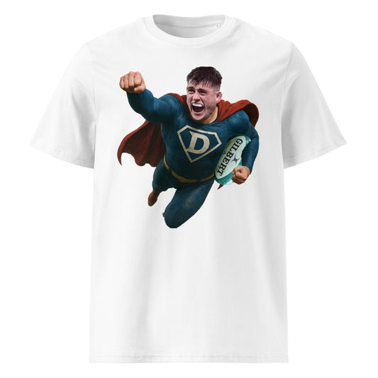 White t-shirt featuring a bold graphic of Dan Sheehan as a flying superhero, complete with red cape, blue suit, and a “D” emblem on his chest. He’s clutching a Gilbert rugby ball mid-flight — a perfect tribute to Leinster’s powerhouse hooker.
