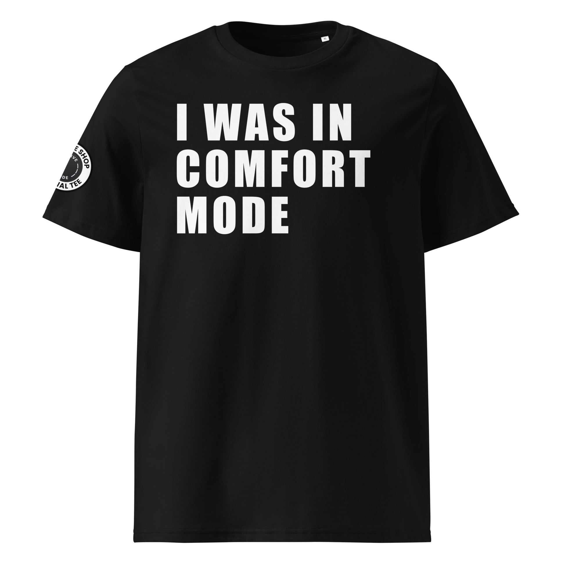 Front view of black unisex t-shirt with bold white “I WAS IN COMFORT MODE” slogan in large font across the chest. DTF print, ideal for car meet fans and driving enthusiasts.
