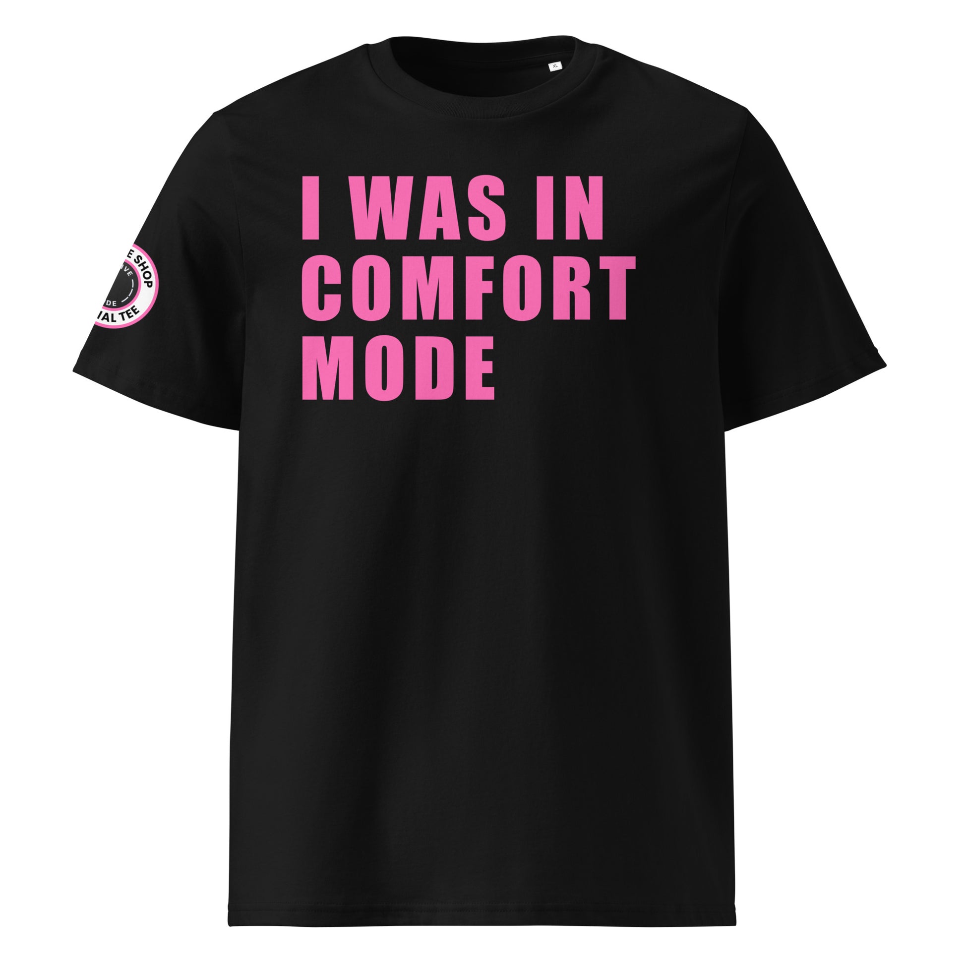Front view of black unisex t-shirt with bold pink “I WAS IN COMFORT MODE” slogan in large font across the chest. DTF print, perfect for car meet fans and petrolheads.