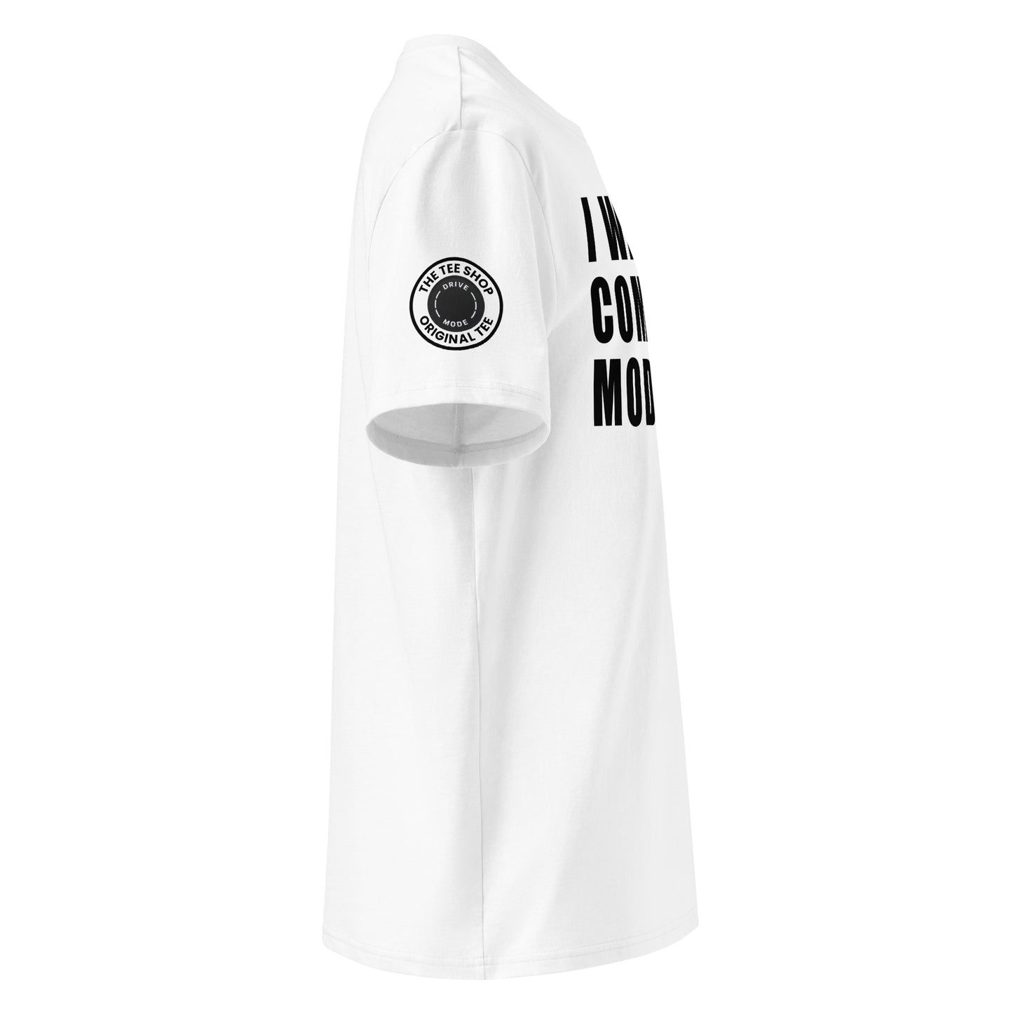 Right side view of white t-shirt showing The Tee Shop’s drive mode button logo patch on the sleeve and edge of the bold “I WAS IN COMFORT MODE” chest print. DTF print, car culture style.