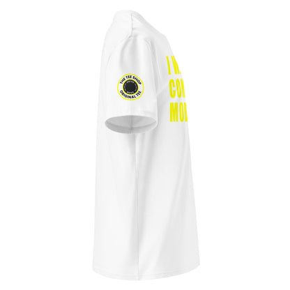 Right side view of white t-shirt showing The Tee Shop’s drive mode button logo patch on the sleeve and edge of the yellow “I WAS IN COMFORT MODE” chest print. DTF print, car culture style.