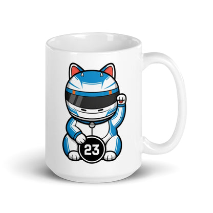 Racing fan mug with blue/white helmet lucky cat illustration and #23 coin great gift for early GP alarms, sleepovers, and subtle support on video calls.