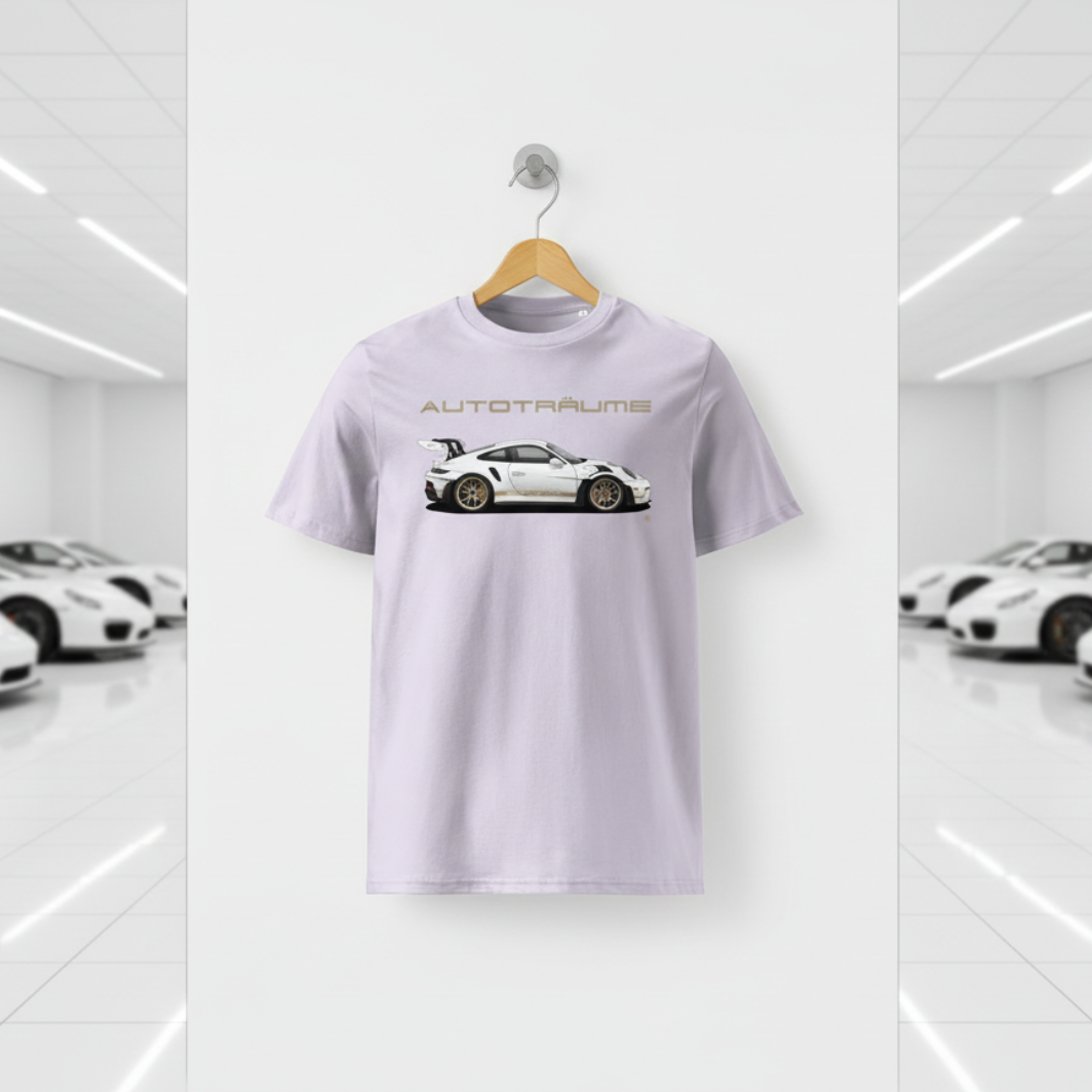 Lavender unisex organic cotton AUTOTRÄUME GT3 RS T-shirt featuring a large, centred white Porsche-style GT3 RS car graphic with gold details hanging on a premium wooden hanger with a silver wall peg against a clean white wall panel in a bright modern sports car gallery with glossy floors and blurred white and silver sports cars on both sides.