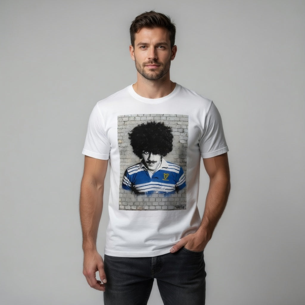 Male model wearing a Leinster Legends Bassline Rebel rugby t-shirt featuring Phil Lynott in a retro Leinster rugby jersey.