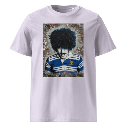 Leinster Legends Rock Poet rugby lavender t-shirt featuring Phil Lynott artwork on a red brick wall.