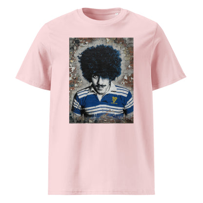 Leinster Legends Rock Poet rugby pink t-shirt featuring Phil Lynott artwork on a red brick wall.
