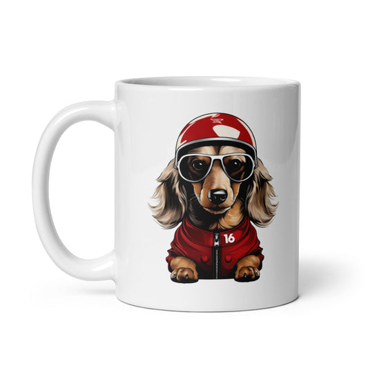 White ceramic 11oz mug featuring a playful illustration of Leo Leclerc, a dachshund wearing sunglasses, a red racing helmet, and a red jacket, inspired by fast dogs.