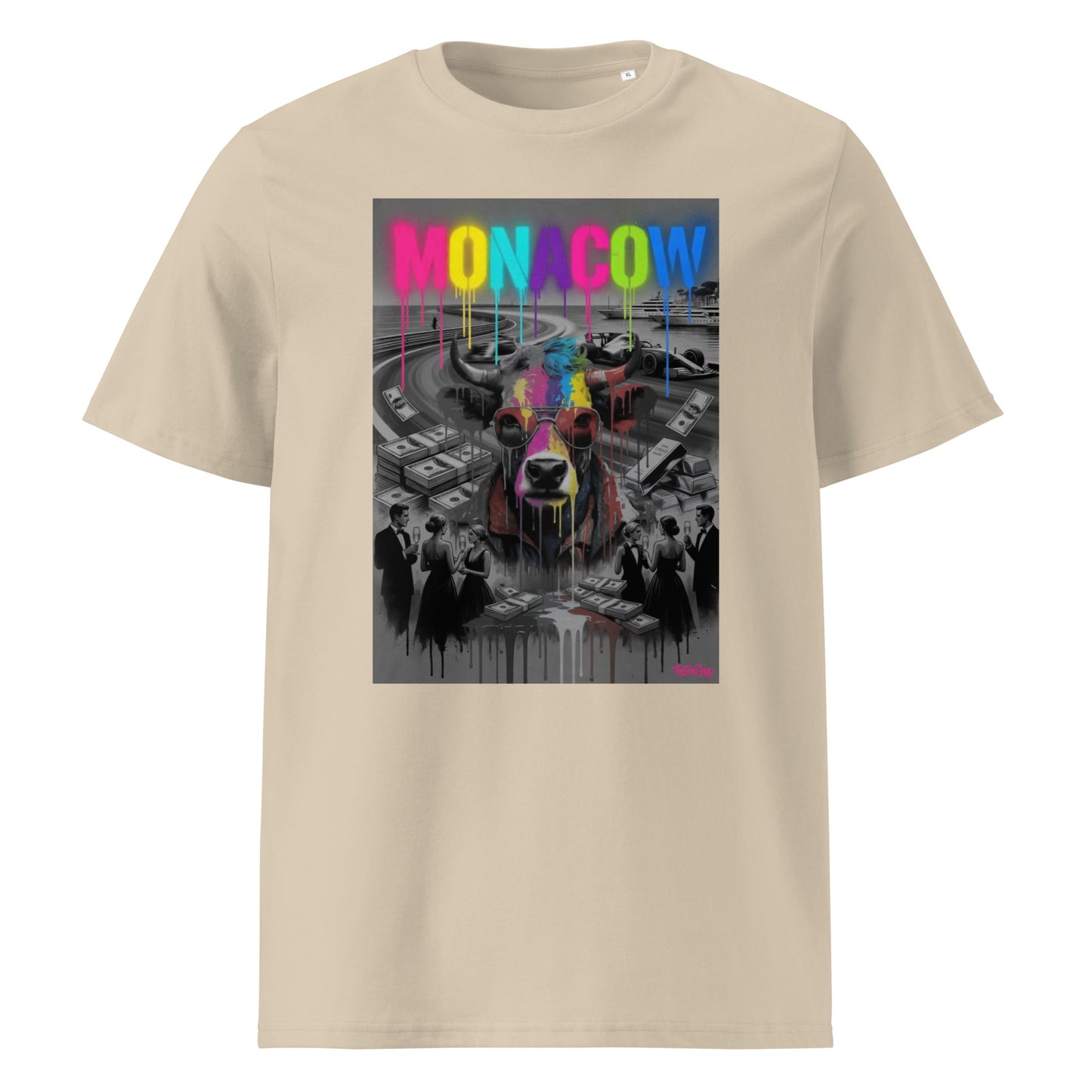Desert dust unisex organic cotton Monaco t-shirt featuring the MONACOW 2026 V1.0 front print—bright drip text and cow graphic over a luxury motorsport-weekend scene.