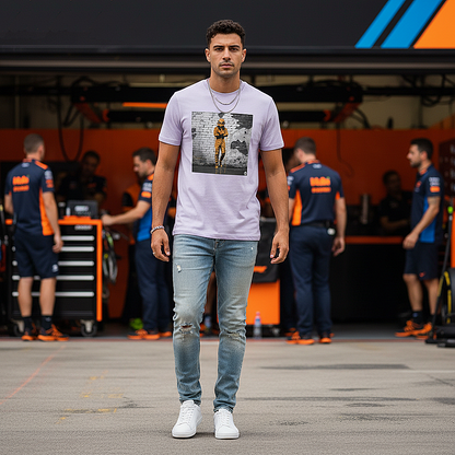 Male model wearing the lavender organic cotton Papaya Driver Mood Graffiti Art F1 T-Shirt featuring a McLaren-inspired driver in vibrant papaya orange graffiti, standing with arms relaxed by his sides in a Papaya F1 paddock environment .