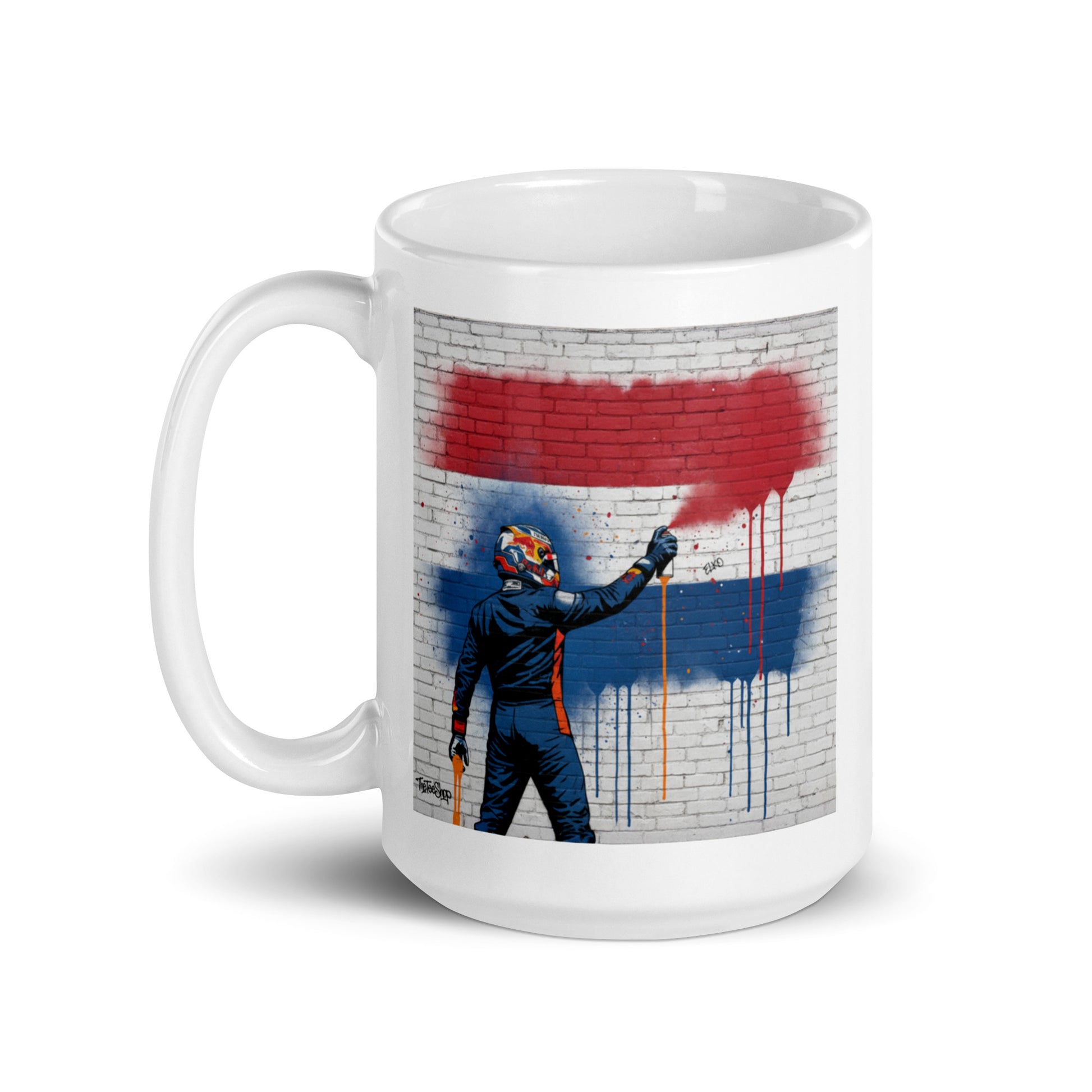 White ceramic 15oz mug featuring a street art illustration of a racing driver spray-painting the red, white, and blue Dutch flag on a brick wall, inspired by Max Verstappen.