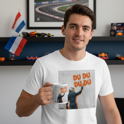 Male model in Max Series DU DU DU DU Graffiti T-Shirt holding the DU DU DU DU Graffiti Mug in a Verstappen-themed home.