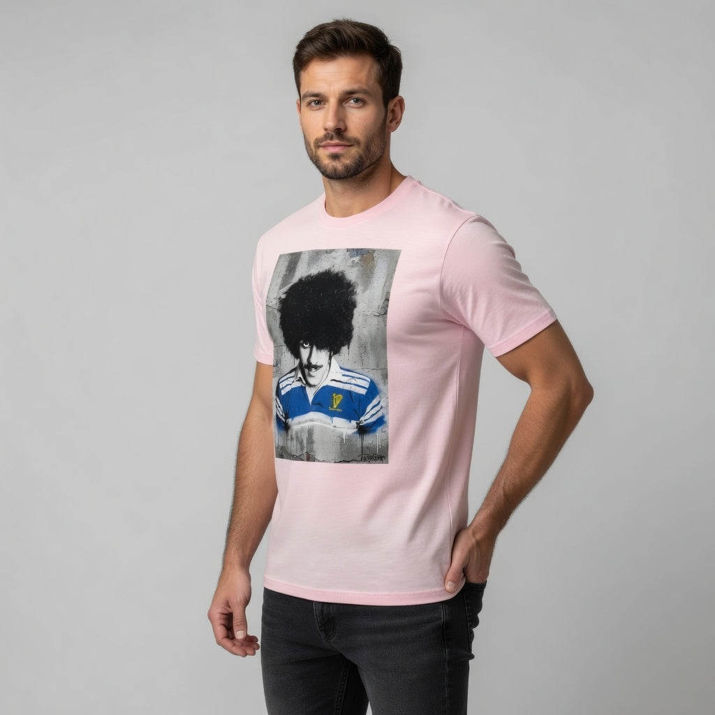 Male model wearing a white Leinster Legends rugby t-shirt featuring a Phil Lynott tribute in a retro Leinster jersey.