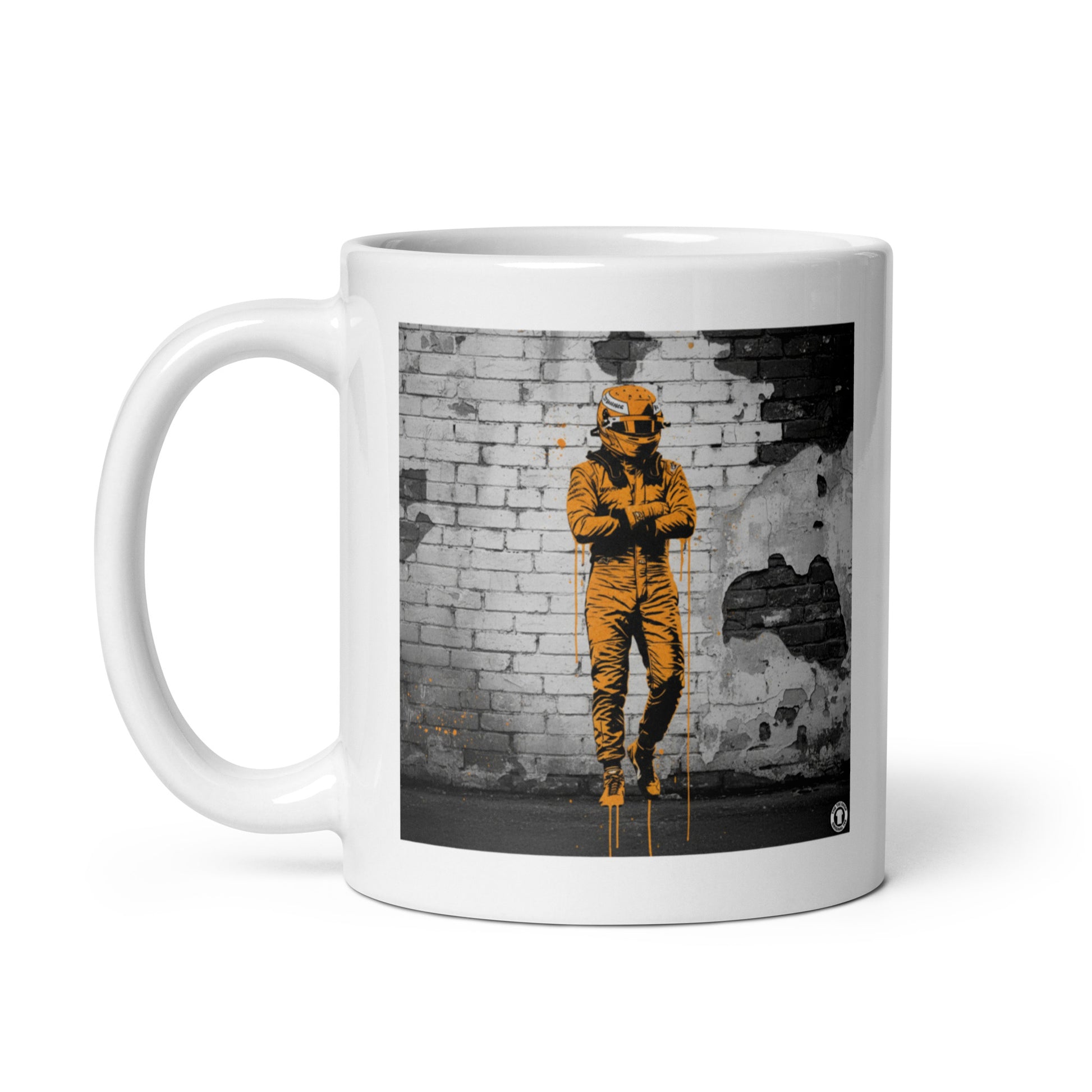 White ceramic 11oz mug featuring a street art illustration of a racing driver in a papaya suit, arms crossed, standing against a distressed brick wall, inspired by McLaren F1.