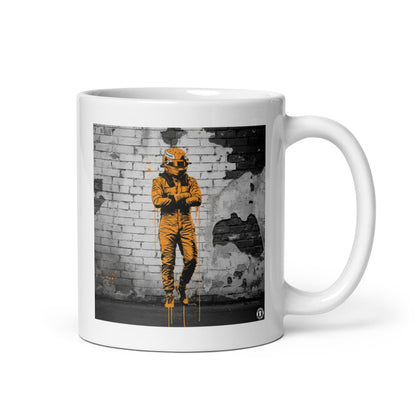 White ceramic 11oz mug featuring a street art illustration of a racing driver in a papaya suit, arms crossed, standing against a distressed brick wall, inspired by McLaren F1.