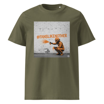 Khaki organic cotton F1 t-shirt with Papaya Fans Like No Other graffiti art design, featuring an F1 driver spray painting #FANSLIKENOOTHER in papaya orange on a brick wall. Perfect for McLaren fans and the Papaya Army.
