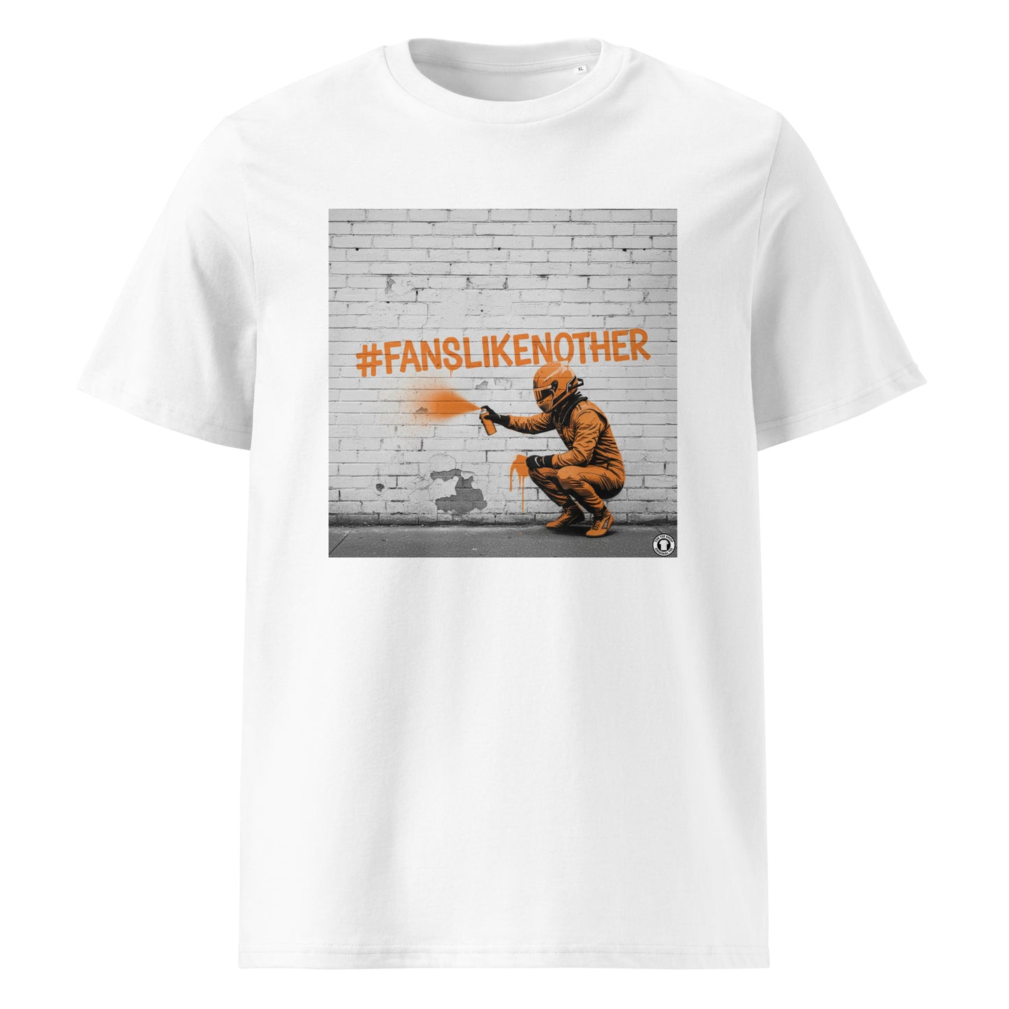 White organic cotton F1 t-shirt with Papaya Fans Like No Other graffiti art design, featuring an F1 driver spray painting #FANSLIKENOOTHER in papaya orange on a brick wall. Perfect for McLaren fans and the Papaya Army.
