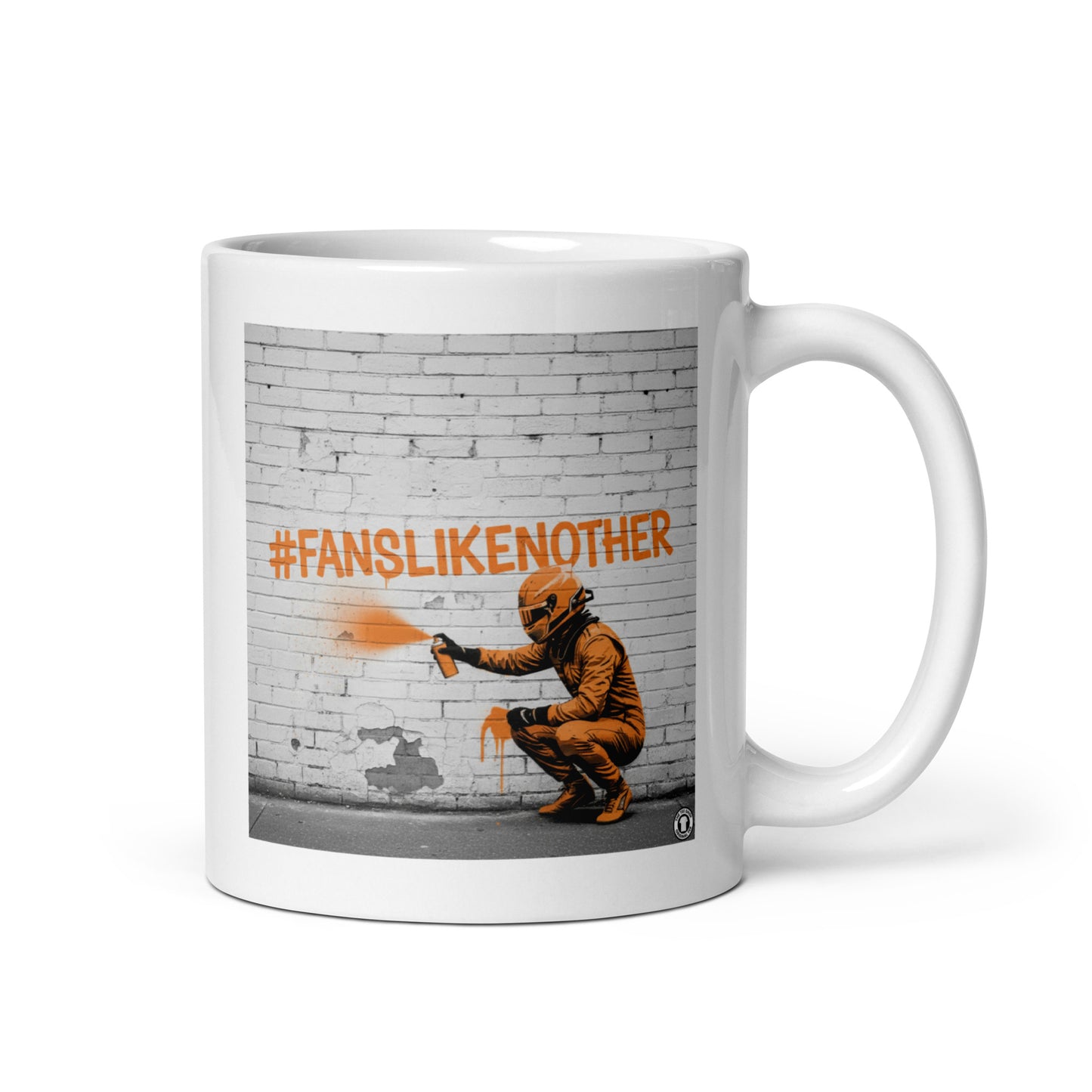 White ceramic 11oz mug featuring a street art illustration of a racing driver spray-painting the hashtag #FANSLIKENOOTHER in papaya orange on a brick wall, inspired by McLaren F1 fans.