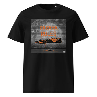 Black organic cotton t-shirt with Papaya Rules graffiti art of an F1 car on a brick wall, showcasing bold papaya orange and black design by TheTeeShop.