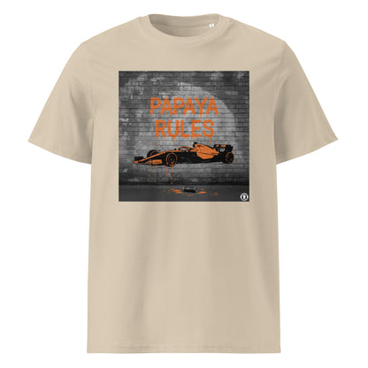 Desert Dust organic cotton t-shirt with Papaya Rules graffiti art of an F1 car on a brick wall, showcasing bold papaya orange and black design by TheTeeShop.