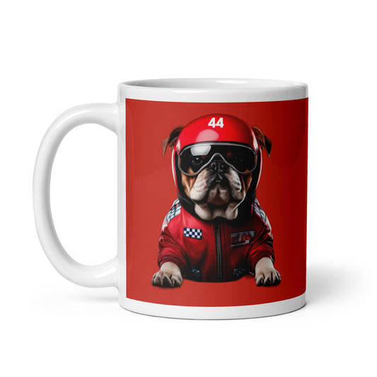 White ceramic 11oz mug with a bold red background featuring a playful illustration of Roscoe, a bulldog in a red racing jacket, sunglasses, and a helmet, inspired by fast dogs.
