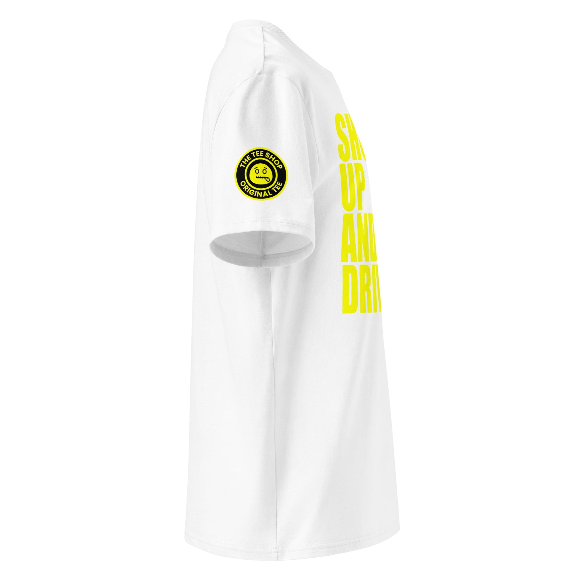 Right side view of white t-shirt showing The Tee Shop’s unique zip it logo on the sleeve and edge of the yellow “SHUT UP AND DRIVE” front print. DTF print, car meet banter style.