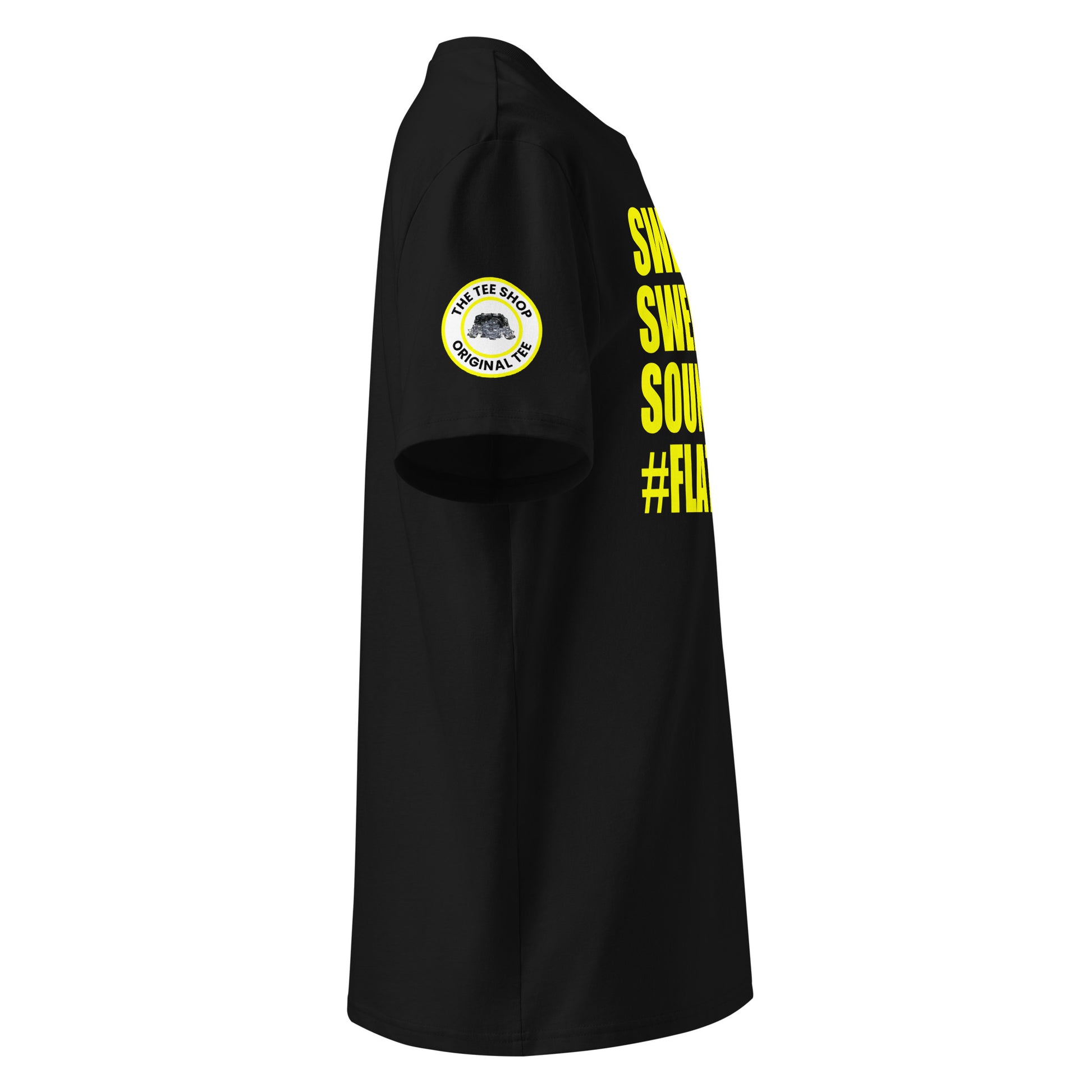 Right side view of black t-shirt showing The Tee Shop’s unique flat six engine logo on the sleeve and edge of the yellow SWEET SWEET SOUNDS #FLATSIX slogan. DTF print, car culture and engine tribute.
